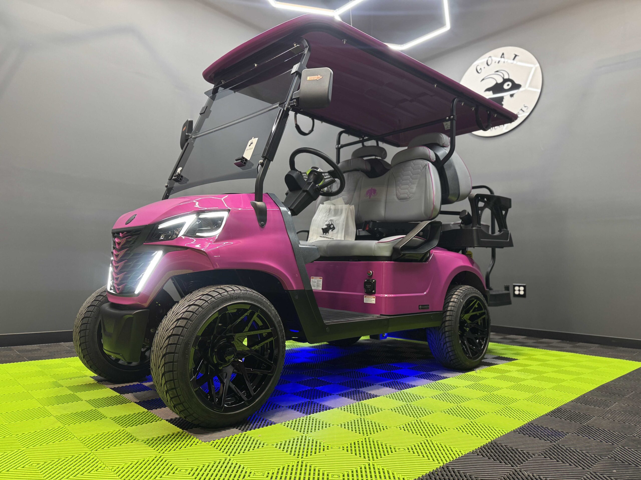 2025 MammothEV XR4 Gloss Hot Magenta w/ Gray Seats With Color Matched Stitch.