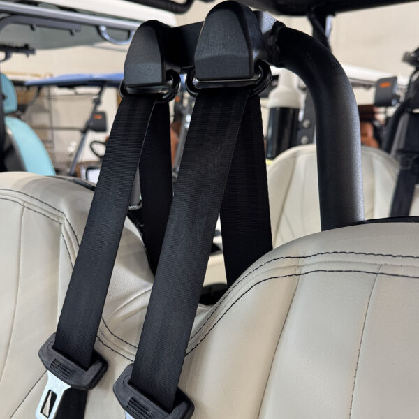 Adjustable three-point seat belts in a MammothEV custom golf cart