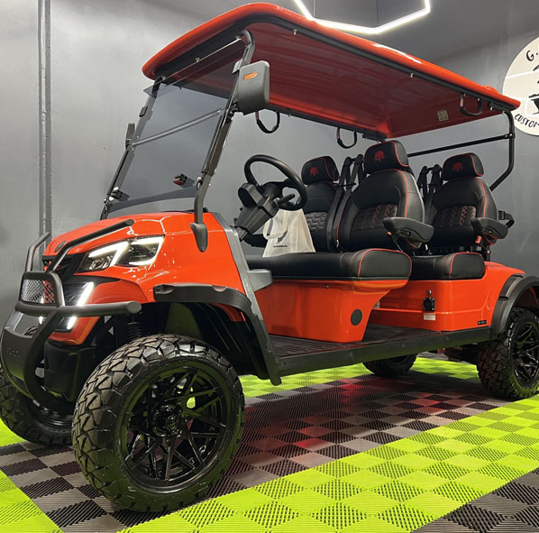 Tangerine orange MammothEV XR4F custom golf cart delivered to Potomac, MD