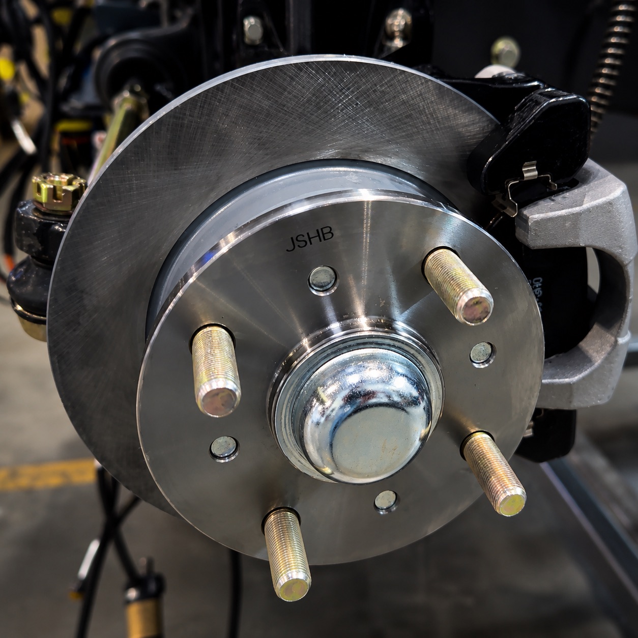Four-wheel disc brakes on a MammothEV custom golf cart