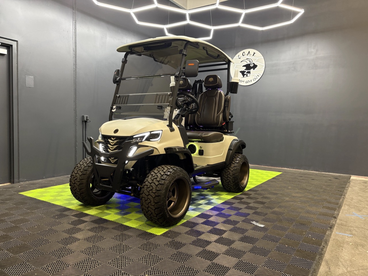 Sand tan MammothEV XR2 custom golf cart with bronze wheels delivered to Nogales, AZ