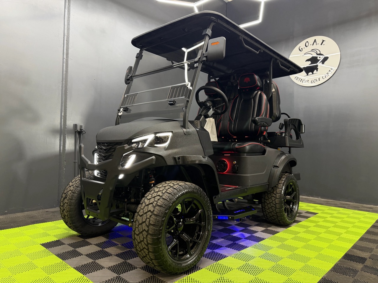 2027 MammothEV XR4 — Matte Black Kevlar / Black Leather Seats / Red Stitch