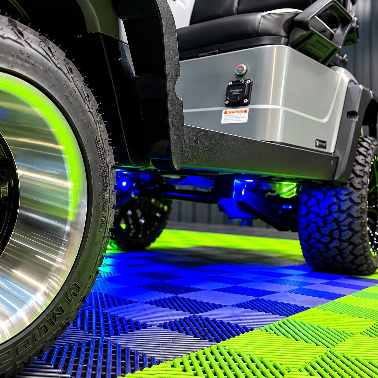 Color changing RGB LED underglow lighting on a MammothEV custom golf cart